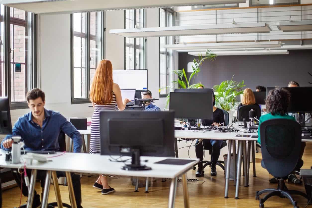 modern office worker using high definition displays